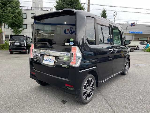 ダイハツ タント カスタム RS SA 東京都 2014(平26)年 5.2万km ブラックマイカメタリック (株)IDOMが運営する【じしゃロン昭島店】の自社ローン専用車両になりますこちらは現金またはオートローンご利用時の価格です。自社ローンご希望の方は別途その旨お申付け下さい/衝突軽減ブレーキ/ETC/スマートキー/プッシュスタート/両側パワースライドドア/Autoライト/LEDヘッドライト/革巻きステアリング/純正フロアマット/純正アルミホイール