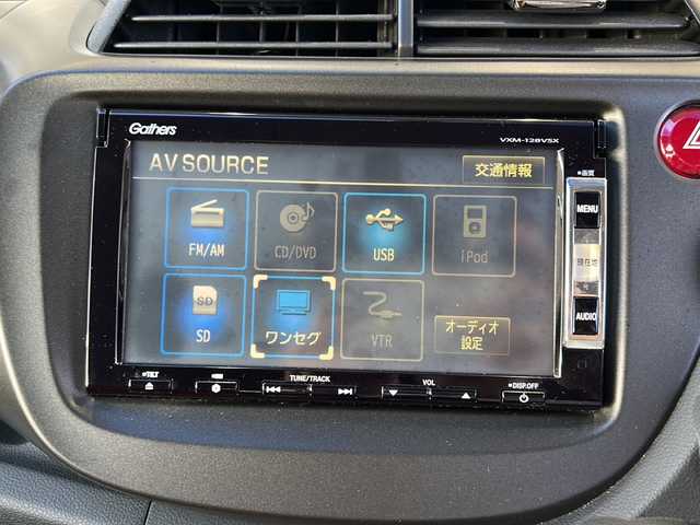 ホンダ フィット RS 愛知県 2012(平24)年 3.7万km サンセットオレンジⅡ 登録時走行距離36172キロ/純正ナビゲーション/６速マニュアルシフト/純正フロアマット/ワンセグＴＶ/横滑り装置/純正アルミホイール/助手席エアバック/オートライト