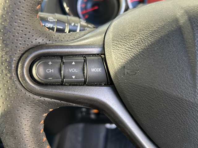ホンダ フィット RS 愛知県 2012(平24)年 3.7万km サンセットオレンジⅡ 登録時走行距離36172キロ/純正ナビゲーション/６速マニュアルシフト/純正フロアマット/ワンセグＴＶ/横滑り装置/純正アルミホイール/助手席エアバック/オートライト