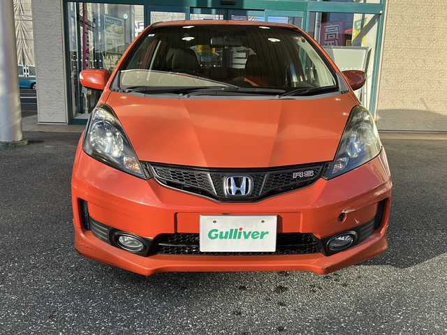 ホンダ フィット RS 愛知県 2012(平24)年 3.7万km サンセットオレンジⅡ 登録時走行距離36172キロ/純正ナビゲーション/６速マニュアルシフト/純正フロアマット/ワンセグＴＶ/横滑り装置/純正アルミホイール/助手席エアバック/オートライト