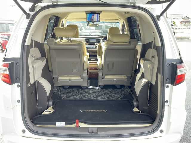ホンダ オデッセイ G 新潟県 2014(平26)年 17.2万km ホワイトオーキッドパール 社外SDナビ/(BT/AM/FM/CD/フルセグTV)/レザーシート/スタッドレスタイヤ/片側パワースライドドア/フリップダウンモニター/オットマン/クルーズコントロール/ABS/横滑り防止装置/盗難防止装置/純正フロアマット