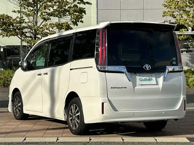 トヨタ エスクァイア Gi 福島県 2019(令1)年 3.7万km ホワイトパールクリスタルシャイン 純正9インチナビ/(FM/AM/CD/DVD/USB/TV/BT)/バックカメラ/フリップダウンモニター/ETC/前後ドライブレコーダー/モデリスタフロントスポイラー/両側パワースライドドア/前席シートヒーター/プリクラッシュセーフティ/レーンディパーチャーアラート/クルーズコントロール/クリアランスソナー/LEDヘッドライト/フォグライト/オートライト/オートマチックハイビーム/純正アルミ/純正フロアマット/ドアバイザー/アイドリングストップ/ステアリングスイッチ/横滑り防止装置
