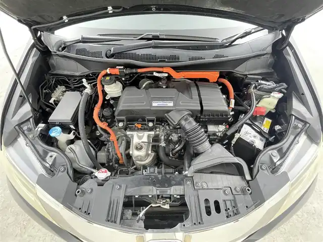 ホンダ オデッセイ ハイブリッド アブソルート EX パッケージ 千葉県 2016(平28)年 6.5万km クリスタルブラックパール 禁煙/フリップダウンモニター/ホンダセンシング/●衝突軽減ブレーキ 〈CMBS〉/●歩行者事故低減ステアリング/●ACC 〈アダプティブ・クルーズ・コントロール〉/●LKAS 〈車線維持支援システム〉/●路外逸脱抑制機能/●誤発進抑制機能/●先行車発進お知らせ機能/●標識認識機能/純正8インチナビ（VXM-175VFEi）/CD/DVD/Bluetooth/フルセグTV/バックカメラ/両側電動スライドドア/ブラインドスポットインフォメーション/ビルトインETC/横滑り防止機能/パワーシート/ハーフレザーシート/ステアリングリモコン/純正17インチアルミホイール/LEDヘッドライト/フォグライト/アクティブコーナリングライト/コンフォートビューパッケージ/AC電源1500W/2列目大型ロールサンシェード/純正フロアマット/スマートキー/スペアキー
