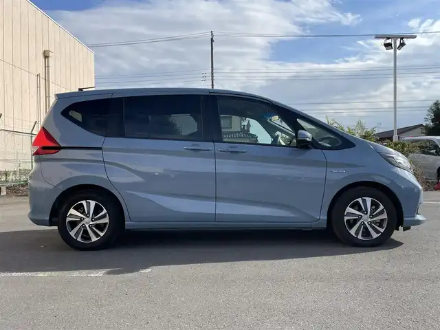 ホンダ フリード ハイブリット G ホンダセンシング 東京都 2020(令2)年 3.2万km シーグラスブルーパール 純正９型メモリナビ＆フルセグ　/・BluetoothAudio/USB/・CD/SD/DVD/AM/FM/両側パワースライドドア　/ＬＥＤヘッドライト　/ホンダセンシング　/・アダプティブクルーズコントロール　/・歩行者事故低減ステアリング　/・標識認識機能/・衝突軽減ブレーキ/・路外逸脱抑制機能/・先行車発進お知らせ機能/キャプテンシート/プッシュエンジンスタート/Wエアバック＆ABS/保証書＆取説/ビルトインＥＴＣ　