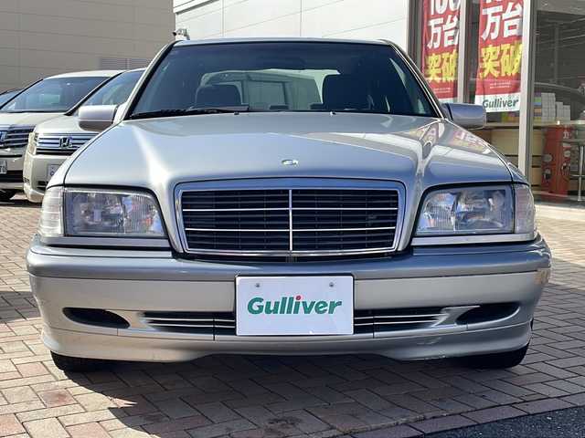 メルセデス・ベンツ Ｃ２００ 鳥取県 1998(平10)年 7.4万km ブリリアントシルバー ディーラー車/純正キーレスx2個/サンルーフ/クルーズコントロール/本木目インテリアパネル/純正カセットデッキ/純正CDチェンジャー/D席パワーシート/サイドエアバック/取説/R5/R3/H27/H21/H19記録簿