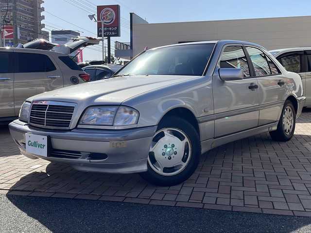 メルセデス・ベンツ Ｃ２００ 鳥取県 1998(平10)年 7.4万km ブリリアントシルバー ディーラー車/純正キーレスx2個/サンルーフ/クルーズコントロール/本木目インテリアパネル/純正カセットデッキ/純正CDチェンジャー/D席パワーシート/サイドエアバック/取説/R5/R3/H27/H21/H19記録簿
