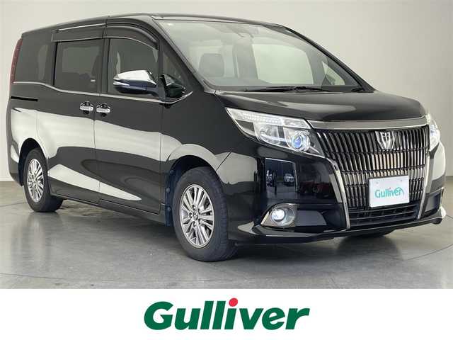 トヨタ エスクァイア Gi ブラックテーラード 愛知県 2016(平28)年 8.6万km ブラック 純正１０型ナビ　フルセグＴＶ　Ｂｌｕｅｔｏｏｔｈ　純正１２．１型後席モニター　シートヒーター　両側パワースライドドア　バックカメラ　レザーシート　衝突軽減　車線逸脱　クルコン　ＬＥＤオートライト　フォグランプ　保証書　取説　ワンオーナー　禁煙