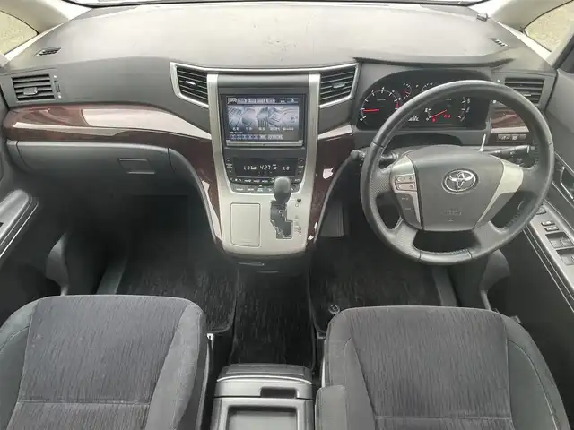 トヨタ ヴェルファイア 2．4Z 熊本県 2012(平24)年 10.6万km ホワイトパールクリスタルシャイン (株)IDOMが運営する【じしゃロン熊本店】の自社ローン専用車両になります/こちらは現金またはオートローンご利用時の価格です。自社ローンご希望の方は別途その旨お申付け下さい./純正ナビ/バックカメラ/ステアリングスイッチ/純正フロアマット/スマートキープッシュスタート/フリップダウンモニター/両側パワースライドドア