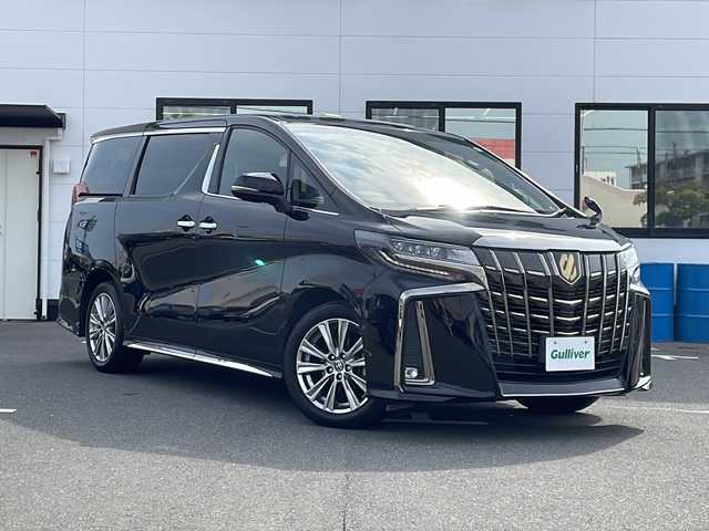 トヨタ アルファード S タイプゴールドⅡ 山口県 2021(令3)年 1.8万km ブラック 純正9インチメモリナビ/・フルセグテレビ/・Bluetooth機能/・AM/FMラジオ/・USB入力(動画・音楽再生・給電)/・Miracast対応8スピーカー/・ハンズフリー機能/ワンタッチスイッチ付きデュアルパワースライドドア/バックカメラ/デジタルインナーミラー/ETC/後席用モニター/前席後席サンルーフ/スマートキー×２(ゴールドメッキ加飾)/プッシュスタート/Toyota Safty Sense/・プリクラッシュセーフティ/・レーントレーシングアシスト/・レーダークルーズコントロール/・ロードサインアシスト/・アダプティブハイビームシステム/先行車発進告知機能/インテリジェントクリアランスソナー/バックガイドモニター/ドライブスターコントロール/盗難防止システム