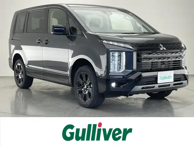 三菱 デリカＤ：５ シャモニー 愛知県 2025(令7)年 0.1千km グレーⅡ CHAMONIX (8人)　4WD　オリジナルナビ取付パッケージ＋リアモニター取付パッケージ(25/300)　ステップレス　（8人）/登録済未使用車　ナビ取付ＰＫＧ　リアモニター取付ＰＫＧ　パドルシフト　ＨＤＭＩ　両側パワスラ　衝突軽減　追従クルコン　ＢＳＭ　ＬＥＤオートライト　ＡＣ１００Ｖ電源　ハーフレザー　シートヒーター　フォグ