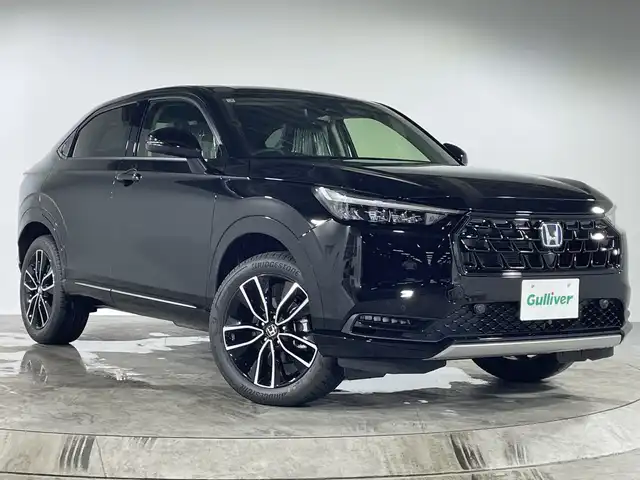 ホンダ ヴェゼル ハイブリッド e:HEV Z 福岡県 2025(令7)年 0.1千km クリスタルブラックパール 登録済み未使用車純正SDナビ（フルセグTV/BT/AppleCarPlay）バックモニターホンダセンシングレーダーククルコンETC2.0電動リアゲートコーナーセンサーシートヒーターパドルシフトBSMオートブレーキホールドLEDヘッドライト
