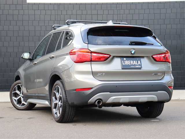 ＢＭＷ Ｘ１ xDrive 18d xライン 宮城県 2018(平30)年 6.7万km プラチナシルバー 純正HDDナビ/ハーフレザーシート/禁煙車/4WD/バックカメラ/アイドリングストップ/ウィンカーミラー/プッシュスタート/パワーバックドア/ETC/LIMスイッチ/インテリジェントセーフティー/パーキングアシスト/フォグランプ/シートヒーター/純正18インチAW/LEDヘッドライト/ルーフレール/ダウンヒルアシスト