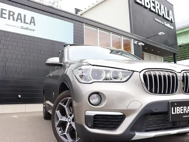 ＢＭＷ Ｘ１ xDrive 18d xライン 宮城県 2018(平30)年 6.7万km プラチナシルバー 純正HDDナビ/ハーフレザーシート/禁煙車/4WD/バックカメラ/アイドリングストップ/ウィンカーミラー/プッシュスタート/パワーバックドア/ETC/LIMスイッチ/インテリジェントセーフティー/パーキングアシスト/フォグランプ/シートヒーター/純正18インチAW/LEDヘッドライト/ルーフレール/ダウンヒルアシスト