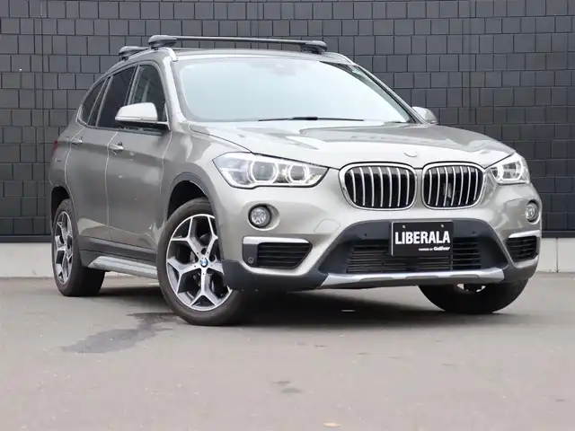ＢＭＷ Ｘ１ xDrive 18d xライン 宮城県 2018(平30)年 6.7万km プラチナシルバー 純正HDDナビ/ハーフレザーシート/禁煙車/4WD/バックカメラ/アイドリングストップ/ウィンカーミラー/プッシュスタート/パワーバックドア/ETC/LIMスイッチ/インテリジェントセーフティー/パーキングアシスト/フォグランプ/シートヒーター/純正18インチAW/LEDヘッドライト/ルーフレール/ダウンヒルアシスト