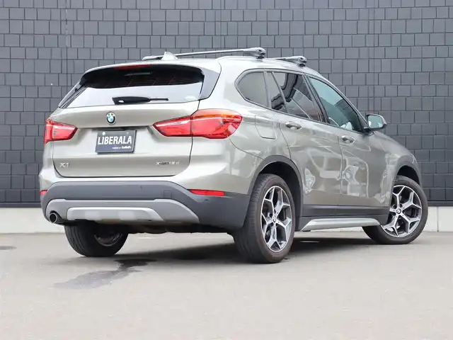 ＢＭＷ Ｘ１ xDrive 18d xライン 宮城県 2018(平30)年 6.7万km プラチナシルバー 純正HDDナビ/ハーフレザーシート/禁煙車/4WD/バックカメラ/アイドリングストップ/ウィンカーミラー/プッシュスタート/パワーバックドア/ETC/LIMスイッチ/インテリジェントセーフティー/パーキングアシスト/フォグランプ/シートヒーター/純正18インチAW/LEDヘッドライト/ルーフレール/ダウンヒルアシスト