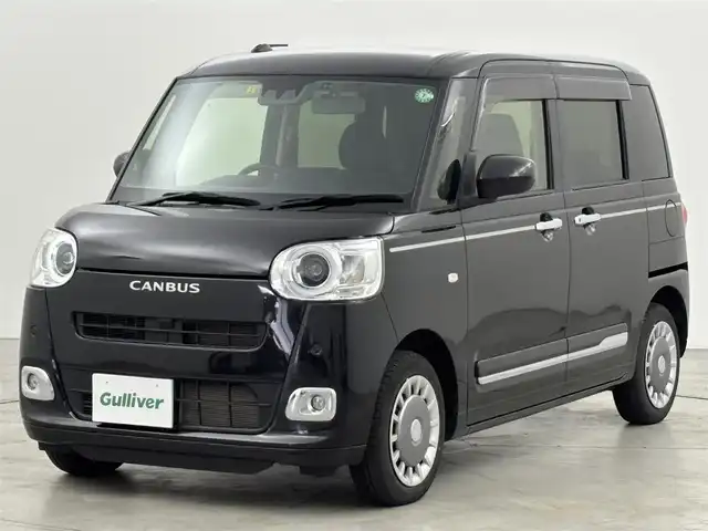 ダイハツ ムーヴ キャンバス セオリー G 山口県 2023(令5)年 1.4万km ブラックマイカメタリック 純正ナビ／フルセグＴＶ　/バックカメラ　/ホッとカップホルダー　/ドライブレコーダー　/コーナーセンサー　/衝突被害軽減ブレーキ　/アイドリングストップ　/両側電動スライドドア　/シートヒーター　/ＬＥＤヘッドライト