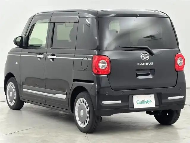 ダイハツ ムーヴ キャンバス セオリー G 山口県 2023(令5)年 1.4万km ブラックマイカメタリック 純正ナビ／フルセグＴＶ　/バックカメラ　/ホッとカップホルダー　/ドライブレコーダー　/コーナーセンサー　/衝突被害軽減ブレーキ　/アイドリングストップ　/両側電動スライドドア　/シートヒーター　/ＬＥＤヘッドライト