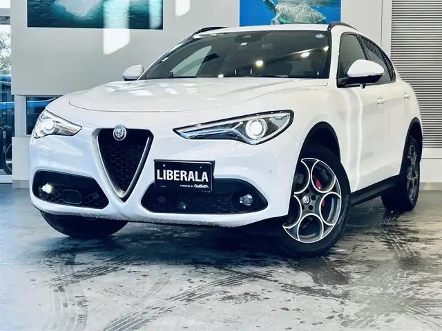 アルファロメオ ステルヴィオ 2.2ターボ ディーゼルQ4 スポーツPKG 大阪府 2019(令1)年 6.5万km 白 ACC/HarmanKardon/純正ディスプレイオーディオ/applecarplay/バックカメラ/純正19インチAW/HIDヘッドライト/電動リアゲート/赤革/パワーシート/Dシートメモリ/シートヒーター/ステアリングヒーター/ルーフレール/パドルシフト/ブラインドスポット/クリアランスソナー