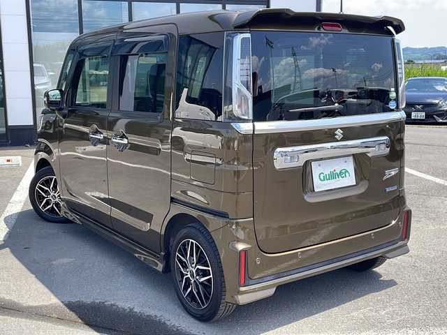 スズキ スペーシア カスタム HYBRID XS ターボ 道東・釧路十勝 2018(平30)年 5.9万km ブレイブカーキP ・4WD/・ターボ/・ディーラーオプション9インチSDメモリナビ/（フルセグ・Bluetooth・CD・DVD・AM・FM)/・全方位モニター/・両側電動スライドドア/・レーダークルーズコントロール/・衝突軽減ブレーキ/・車線逸脱防止機能/・コーナーセンサー/・ETC/・全方位ドライブレコーダー/・ハーフレザシート/・前席シートヒーター/・LEDヘッドライト/・ステアリングスイッチ/・ドアバイザー/・パドルシフト/・ヘッドアップディスプレイ/・後席ドリンクホルダー/・後席サンシェード/・保証書/・スマートキー/・プッシュスタート