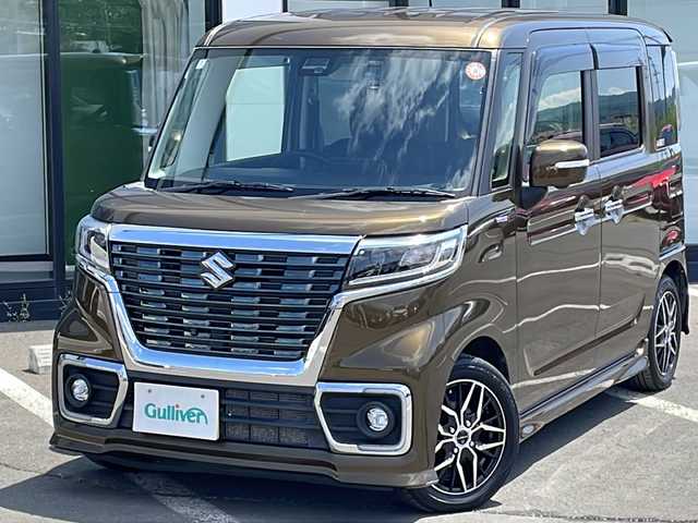 スズキ スペーシア カスタム HYBRID XS ターボ 道東・釧路十勝 2018(平30)年 5.9万km ブレイブカーキP ・4WD/・ターボ/・ディーラーオプション9インチSDメモリナビ/（フルセグ・Bluetooth・CD・DVD・AM・FM)/・全方位モニター/・両側電動スライドドア/・レーダークルーズコントロール/・衝突軽減ブレーキ/・車線逸脱防止機能/・コーナーセンサー/・ETC/・全方位ドライブレコーダー/・ハーフレザシート/・前席シートヒーター/・LEDヘッドライト/・ステアリングスイッチ/・ドアバイザー/・パドルシフト/・ヘッドアップディスプレイ/・後席ドリンクホルダー/・後席サンシェード/・保証書/・スマートキー/・プッシュスタート