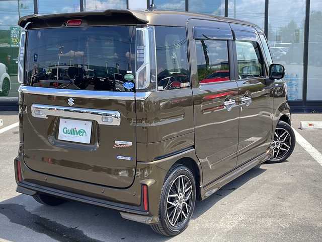 スズキ スペーシア カスタム HYBRID XS ターボ 道東・釧路十勝 2018(平30)年 5.9万km ブレイブカーキP ・4WD/・ターボ/・ディーラーオプション9インチSDメモリナビ/（フルセグ・Bluetooth・CD・DVD・AM・FM)/・全方位モニター/・両側電動スライドドア/・レーダークルーズコントロール/・衝突軽減ブレーキ/・車線逸脱防止機能/・コーナーセンサー/・ETC/・全方位ドライブレコーダー/・ハーフレザシート/・前席シートヒーター/・LEDヘッドライト/・ステアリングスイッチ/・ドアバイザー/・パドルシフト/・ヘッドアップディスプレイ/・後席ドリンクホルダー/・後席サンシェード/・保証書/・スマートキー/・プッシュスタート