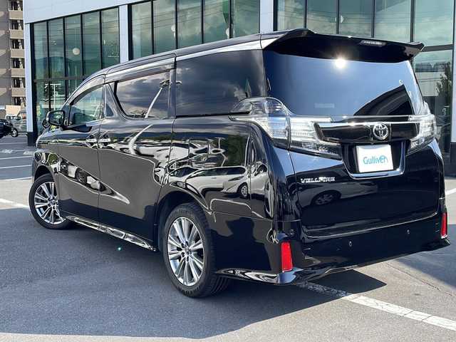 トヨタ ヴェルファイア 2.5Z Aエディデョン ゴールデンアイズ 青森県 2016(平28)年 17.7万km ブラック トヨタセーフティーセンス/・プリクラッシュセーフティ/・インテリジェントクリアランスソナー/・レーダークルーズコントロール/４WD/純正10インチナビ【NSZN-Z66T】/（CD/DVD/フルセグTV/Bluetooth）/社外後部用モニター【TVM-PW900】/バックカメラ/両側パワースライドドア/ウッドコンビステアリング/ステアリングスイッチ/ビルトインETC/アイドリングストップ/ドライブレコーダー/nanoe/電動パーキングブレーキ/オートホールド/電動リアゲート/ハーフレザーシート/LEDヘッドライト/フォグランプ/オートライト/AC100V・100Wコンセント/スマートキー/Pスタート/ウィンカーミラー/電動格納ミラー/３列シート/オットマン/横滑り防止装置/コーナーセンサー/純正フロアマット/純正18インチAW/保証書/取扱説明書/W/サイドエアバッグ/スペアキー/エンジンスターター