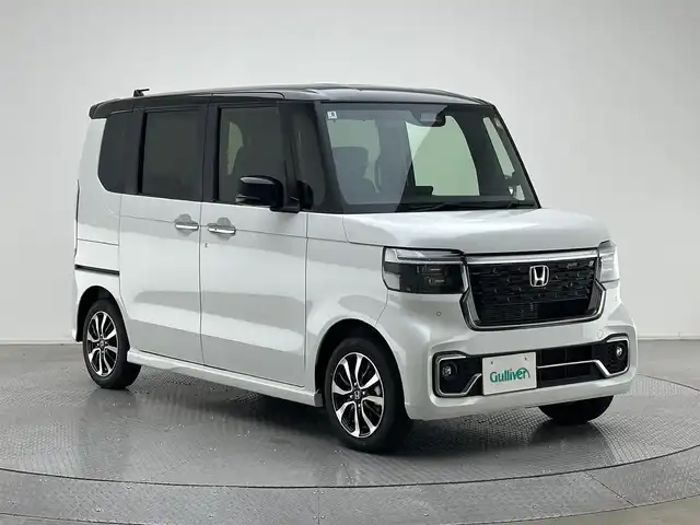 ホンダ Ｎ ＢＯＸ カスタム コーディネートスタイル 兵庫県 2025(令7)年 0.1千km プラチナホワイトパール カスタムコーディネートスタイル3164UG8　/マルチビューカメラ/9インチナビLXU-242NBi(248600円)/純正メモリナビ(CD/DVD/SD/Bluetooth/フルセグ)/全方位カメラ/前後コーナーセンサー/ハーフレザーシート/シートヒーター/両側パワースライドドア/追従型クルーズコントロール/オートライト/オートマチックハイビーム/LEDヘッドライト/LEDフォグライト/レーンキープアシスト/純正14インチアルミホイール