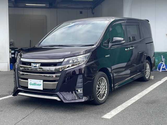 トヨタ ノア ハイブリッド Si 京都府 2018(平30)年 6.6万km ボルドーマイカメタリック 純正９インチナビ　Ｂｌｕｅｔｏｏｔｈオーディオ　フルセグ　ＤＶＤ再生　バックカメラ　後席フリップダウンモニター　プリクラッシュ　クルーズコントロール　ＬＥＤヘッドライト　ビルトインＥＴＣ　前後ドラレコ