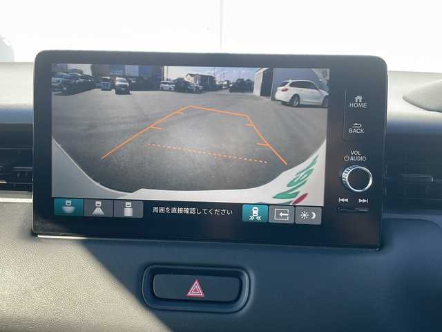 ホンダ ヴェゼル ハイブリッド e:HEV Z 三重県 2024(令6)年 3.2万km プレミアムサンライトホワイトパール 純正ナビ/ＡｐｐｌｅＣａｒＰｌａｙ/ＡｎｄｒｏｉｄｏAuto/BSM/ビルトインETC2.0/ワイヤレス充電/スペアキー/シートヒーター/ステアリングヒーター/パドルシフト/ステアリングスイッチ/ハーフレザーシート/電動リアゲート/追従クルーズコントロール/レーンキープアシスト/SOSコール/衝突被害軽減システム/踏み間違い防止/先行車発進お知らせ/標識認識システム/LEDオートライト/禁煙車