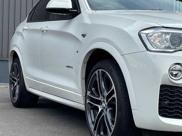 ＢＭＷ Ｘ４ xDrive 28i Mスポーツ 青森県 2016(平28)年 5万km アルピンホワイトⅢ /4WD/ターボ/後期　/インテリジェントＳＦＴ　/ＬＤＷ　/ＬＣＷ　/ＡＣＣ　/３６０度カメラ　/ＯＰ２０インチアルミホイール/茶革シート/前席シートヒーター/ＰＷシート　/パワーバックドア　/HIDオートライト/オートワイパー/ヘットライトウオッシャー/純正HDDナビ　/　(フルセグTV/DVD/Bt/AUX/USB)/ＥＴＣ　/革巻きステア/パドルシフト/オーディオ/ステアスイッチ/ヒルクライムアシスト/前後バンパーソナー/純正フロアマット/ウインカーミラー /純正ドラレコ/電格調整ミラー/リア7面スモークフィルム/W/サイド/カーテンエアバッグ /ABS/スマートキーx2/保証書/取説