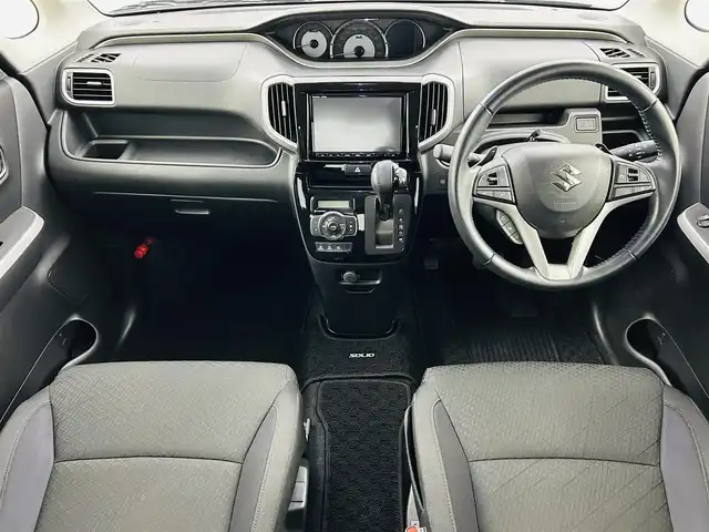 スズキ ソリオ バンディット HV MV 福島県 2019(令1)年 2.5万km プレミアムシルバーメタリック スズキセーフティサポート/・衝突軽減ブレーキ/・車線逸脱警報装置/純正8インチ大画面ナビ/・型番：CN-RZ843/・フルセグTV/Bluetooth/CD/DVD/・全方位カメラ/・ETC/・ドライブレコーダー/アイドリングストップ/左側パワースライドドア/レーダークルーズコントロール/コーナーセンサー/革巻きステアリング/・ステアリングリモコン/シートヒーター(運転席)/プッシュスタート/・スマートキー/LEDヘッドライト/・オートライト/純正フロアマット/ドアバイザー/電動格納ミラー