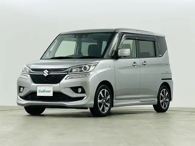 スズキ ソリオ バンディット HV MV 福島県 2019(令1)年 2.5万km プレミアムシルバーメタリック スズキセーフティサポート/・衝突軽減ブレーキ/・車線逸脱警報装置/純正8インチ大画面ナビ/・型番：CN-RZ843/・フルセグTV/Bluetooth/CD/DVD/・全方位カメラ/・ETC/・ドライブレコーダー/アイドリングストップ/左側パワースライドドア/レーダークルーズコントロール/コーナーセンサー/革巻きステアリング/・ステアリングリモコン/シートヒーター(運転席)/プッシュスタート/・スマートキー/LEDヘッドライト/・オートライト/純正フロアマット/ドアバイザー/電動格納ミラー