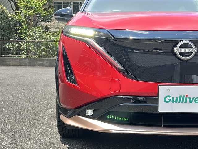 日産 アリア B6 埼玉県 2022(令4)年 4.8万km カーマインレッド 登録時４７３９０ｋｍ/サンルーフ/純正SDナビ/Apple CarPlay/Android Auto/・AM/FM/BT/フルセグTV/360°セーフティーアシスト/プロパイロット/運転支援/車線逸脱防止支援/踏み間違い衝突防止支援/e-Pedal/インテリジェントクルーズコントロール/プロパイロットパーキング/プラグインハイブリット/全方位カメラ/ブラインドスポットモニター/BOSEスピーカー/パーキングブレーキホールド/ハンドル支援/デジタルインナーミラー/前ドライブレコーダー（DH5-S）/革シート/パワーシート（D＋N）/   /メモリーシート（D＋N）/全席シートヒーター/前席エアーシート/電動リアゲート/ステアリングリモコン/SPORTモード/ECOモード/純正19インチAW/プッシュスタート/スマートキー×２/携帯背面充電装置/LEDヘッドライト/フォグランプ/オートライト/オートハイビーム/USB入力端子/革巻きハンドル/電動格納ミラー/ウィンカーミラー/ドアバイザー/純正フロアマット/充電ケーブルあり/ナビ取扱説明書/取扱説明書/保証書
