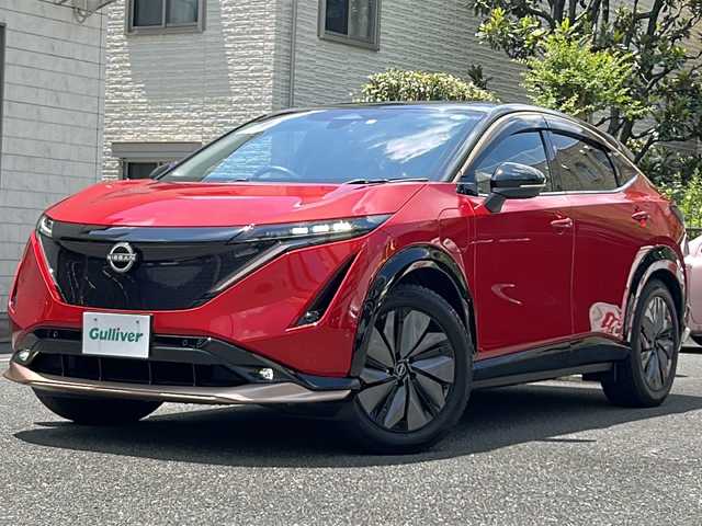 日産 アリア B6 埼玉県 2022(令4)年 4.8万km カーマインレッド 登録時４７３９０ｋｍ/サンルーフ/純正SDナビ/Apple CarPlay/Android Auto/・AM/FM/BT/フルセグTV/360°セーフティーアシスト/プロパイロット/運転支援/車線逸脱防止支援/踏み間違い衝突防止支援/e-Pedal/インテリジェントクルーズコントロール/プロパイロットパーキング/プラグインハイブリット/全方位カメラ/ブラインドスポットモニター/BOSEスピーカー/パーキングブレーキホールド/ハンドル支援/デジタルインナーミラー/前ドライブレコーダー（DH5-S）/革シート/パワーシート（D＋N）/   /メモリーシート（D＋N）/全席シートヒーター/前席エアーシート/電動リアゲート/ステアリングリモコン/SPORTモード/ECOモード/純正19インチAW/プッシュスタート/スマートキー×２/携帯背面充電装置/LEDヘッドライト/フォグランプ/オートライト/オートハイビーム/USB入力端子/革巻きハンドル/電動格納ミラー/ウィンカーミラー/ドアバイザー/純正フロアマット/充電ケーブルあり/ナビ取扱説明書/取扱説明書/保証書