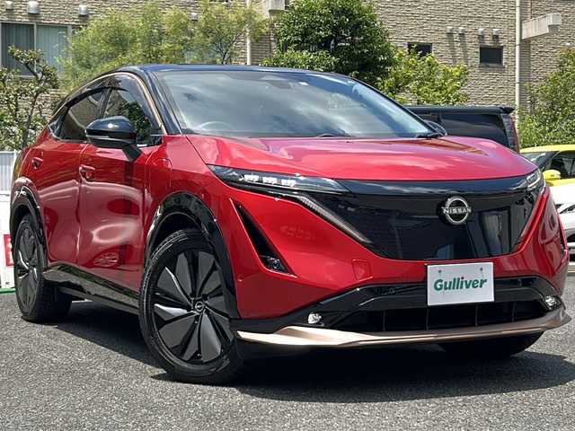 日産 アリア B6 埼玉県 2022(令4)年 4.8万km カーマインレッド 登録時４７３９０ｋｍ/サンルーフ/純正SDナビ/Apple CarPlay/Android Auto/・AM/FM/BT/フルセグTV/360°セーフティーアシスト/プロパイロット/運転支援/車線逸脱防止支援/踏み間違い衝突防止支援/e-Pedal/インテリジェントクルーズコントロール/プロパイロットパーキング/プラグインハイブリット/全方位カメラ/ブラインドスポットモニター/BOSEスピーカー/パーキングブレーキホールド/ハンドル支援/デジタルインナーミラー/前ドライブレコーダー（DH5-S）/革シート/パワーシート（D＋N）/   /メモリーシート（D＋N）/全席シートヒーター/前席エアーシート/電動リアゲート/ステアリングリモコン/SPORTモード/ECOモード/純正19インチAW/プッシュスタート/スマートキー×２/携帯背面充電装置/LEDヘッドライト/フォグランプ/オートライト/オートハイビーム/USB入力端子/革巻きハンドル/電動格納ミラー/ウィンカーミラー/ドアバイザー/純正フロアマット/充電ケーブルあり/ナビ取扱説明書/取扱説明書/保証書