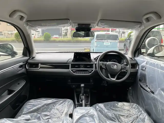 ホンダ ＷＲ－Ｖ X 三重県 2025(令7)年 0.1万km未満 プラチナホワイトパール 未使用車/車検R10年6月22日/走行距離21km/♪ホンダセンシング/・衝突軽減ブレーキ(CMBS)/・踏み間違い衝突軽減システム/・路外逸脱抑制機能/・歩行者事故低減ステアリング/・先行車発進お知らせ機能/・アダプティブクルーズコントロール(ACC)/・車線維持支援システム(LKAS)/♪スマートキー×2/♪プッシュスタート/♪LEDヘッドライト/♪オートライト/♪オートハイビーム/♪ヘッドライトレベライザー/♪ステアリングスイッチ/♪パドルシフト/♪電格ミラー/♪充電用USBポート×2