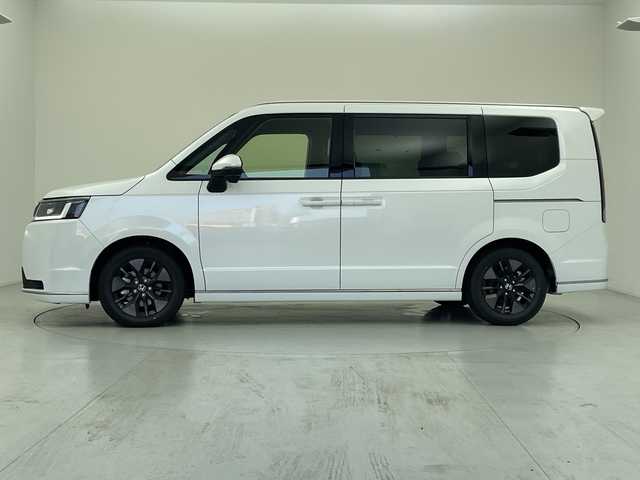 ホンダ ステップワゴン スパーダ eHEV 愛知県 2025(令7)年 0.1千km プラチナホワイトパール 登録済未使用車/純正１１インチナビ/・フルセグ/・Ｂｌｕｅｔｏｏｔｈ/・ＤＶＤ/・ＣＤ/・FM/AM/・AppleCarPlay/・AndroidAuto/両側パワースライドドア/バックカメラ/アダプティブクルーズコントロール/ホンダセンシング/衝突軽減ブレーキ/前後誤発進抑制機能/車線逸脱抑制機能/トラフィックジャムアシスト/車線維持支援システム/先行車発進お知らせ機能/オートマチックハイビーム/標識認識機能/コーナーセンサー/電動リアゲート/オットマン/パドルシフト/LEDヘッドライト/カーテンエアバック