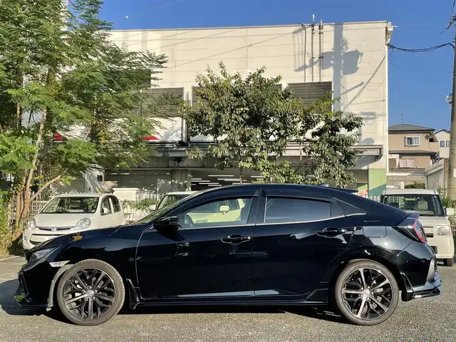 ホンダ シビック ハッチバック 熊本県 2020(令2)年 5.2万km クリスタルブラックパール ワンオーナー/ホンダセンシング/プッシュスタート/純正ナビ/（CD・DVD・フルセグTV・BTオーディオ・SD）/バックカメラ/ビルトインETC/純正前後ドライブレコーダー/純正18インチAW/レーダークルーズ/ハーフレザーシート/前席シートヒーター/LEDヘッドライト/オートライト/フォグライト/横滑り防止装置/ウィンカーミラー/純正フロアマット/純正ドアバイザー/新車保証書/取扱説明書
