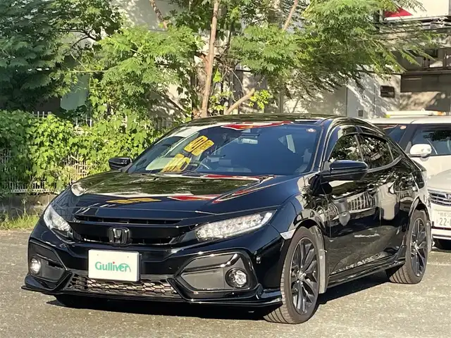 ホンダ シビック ハッチバック 熊本県 2020(令2)年 5.2万km クリスタルブラックパール ワンオーナー/ホンダセンシング/プッシュスタート/純正ナビ/（CD・DVD・フルセグTV・BTオーディオ・SD）/バックカメラ/ビルトインETC/純正前後ドライブレコーダー/純正18インチAW/レーダークルーズ/ハーフレザーシート/前席シートヒーター/LEDヘッドライト/オートライト/フォグライト/横滑り防止装置/ウィンカーミラー/純正フロアマット/純正ドアバイザー/新車保証書/取扱説明書