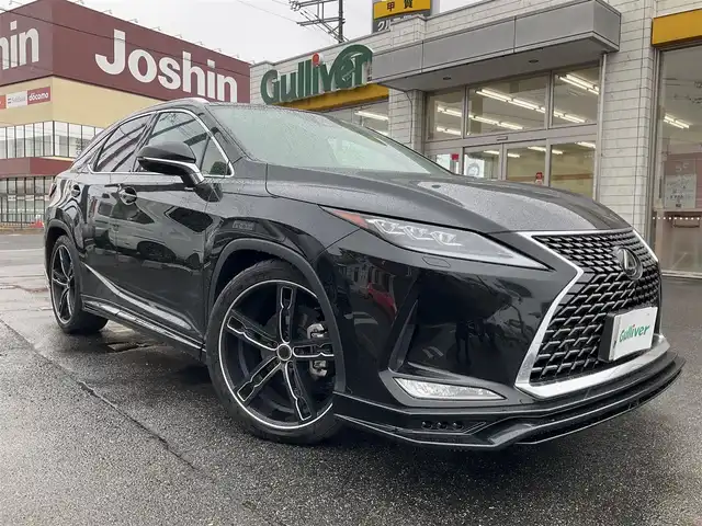 レクサス ＲＸ 300 バージョンL 滋賀県 2022(令4)年 1.2万km グラファイトブラックガラスフレーク ワンオーナー/レクサスセーフティシステムプラス/ブラインドスポットモニター/社外エアロキット/社外22インチアルミホイール/社外デジタルインナーミラー（前後ドラレコ機能）/エムズスピードマフラー/RS-Rダウンサス/パノラマルーフ/リアシートエンターテインメントシステム/12.3インチディスプレイ/Bluetooth、フルセグテレビ/パノラミックビューモニター/バックカメラ/ビルトインETC2.0/カラーヘッドアップディスプレイ/全席シートヒーター/ステアリングヒーター/三眼フルLEDヘッドライト/LEDフォグランプ/パワーバックドア/スペアキー/カードキー有り/保証書