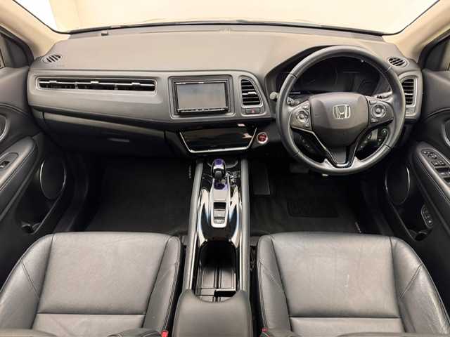 ホンダ ヴェゼル ハイブリッド 兵庫県 2016(平28)年 10.3万km クリスタルブラックパール 社外7インチナビ（CD/DVD・FM/AM・BT・フルセグ）/ホンダセンシング/ETC/HDMI/プッシュスタート/スマートキー2本/レザーシート/パワーシート（D/N席）/シートヒーター（D/N席）/シートメモリー（D席）/純正AW17インチ/純正フロアマット/追従式クルーズコントロール/パドルシフト/ルーフレール/電動パーキング/オートブレーキホールド/LEDヘッドランプ/フォグランプ/オートライト/電動格納ミラー/ウインカーミラー/ドアバイザー/自動防眩ミラー/チャイルドシート対応