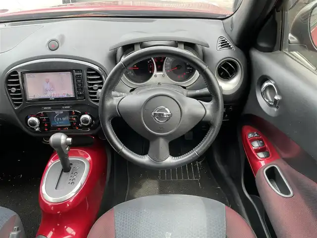 日産 ジューク 15RX タイプV 福岡県 2014(平26)年 10.1万km ラディアントレッド (株)IDOMが運営する【じしゃロン八幡西店】の自社ローン専用車両になります。こちらは現金またはオートローンご利用時の価格です。自社ローンご希望の方は別途その旨お申付け下さい/SDナビ/【Bluetooth・CD・DVD・TV】/ETC/純正フロアマット/純正アルミホイール/アイドリングストップ/バックカメラ/オートライト/フロントフォグランプ