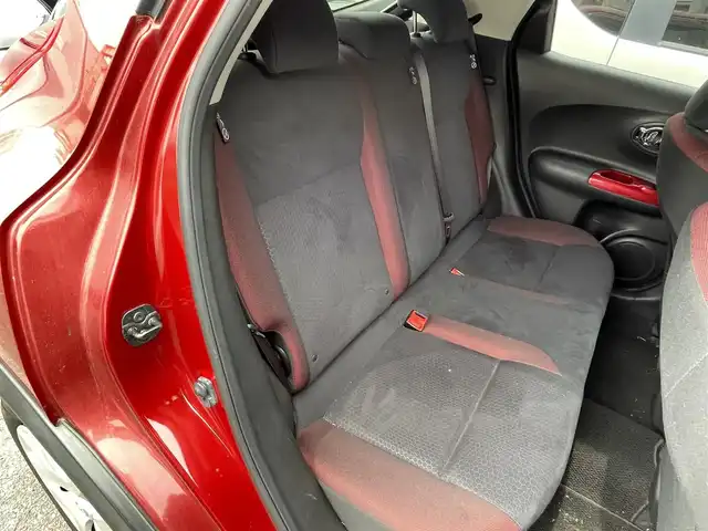 日産 ジューク 15RX タイプV 福岡県 2014(平26)年 10.1万km ラディアントレッド (株)IDOMが運営する【じしゃロン八幡西店】の自社ローン専用車両になります。こちらは現金またはオートローンご利用時の価格です。自社ローンご希望の方は別途その旨お申付け下さい/SDナビ/【Bluetooth・CD・DVD・TV】/ETC/純正フロアマット/純正アルミホイール/アイドリングストップ/バックカメラ/オートライト/フロントフォグランプ