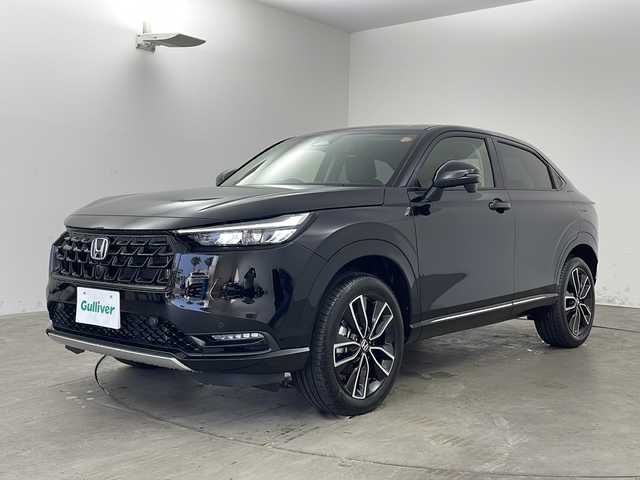 ホンダ ヴェゼル ハイブリッド e:HEV Z 兵庫県 2025(令7)年 0.1千km クリスタルブラックパール ・純正ディスプレイオーディオ/・AM/FM/BT/USB/Apple CarPlay/Android Auto/・フルセグTV/・ホンダセンシング/・衝突軽減ブレーキ/・先行車発進お知らせ/・路外逸脱抑制システム/・レーンキープアシスト/・ブラインドスポットモニター/・標識認識機能/・アダプティブドライビングビーム/・デイタイムランニングライト/・LEDオートライト/・レーダークルーズコントロール/・クリアランスソナー/・前後コーナーセンサー/・横滑り防止装置/・バックカメラ/・電動パーキングブレーキ/・ブレーキホールド/・置くだけ充電/・パワーバックドア/・ハンズフリー開閉パワーテールゲート/・前席シートヒーター/・ステアリングヒーター/・革巻きステアリング/・ステアリングリモコン/・左右独立エアコン/・ビルトインETC2.0/・スマートキー/・スペアキー/・プッシュスタート