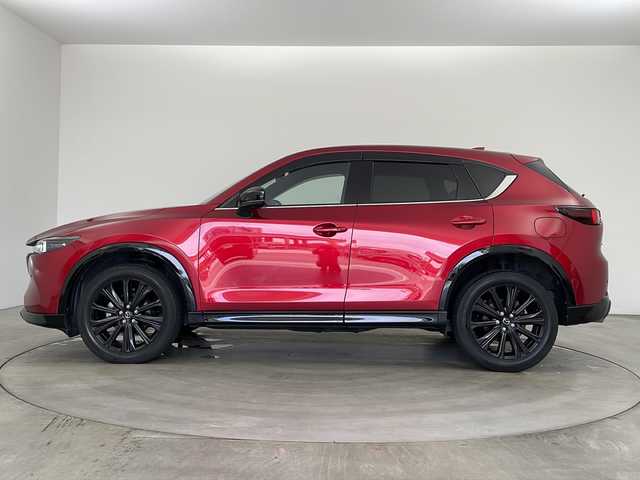マツダ ＣＸ－５ XD スポーツアピアランス 兵庫県 2022(令4)年 6.7万km ソウルレッドクリスタルM ・地上デジタルＴＶチューナー（フルセグ）/・純正ナビ&BT＆DVD＆USB/・360°カメラ/・クルージング＆トラフィック・サポート/・フロント＆リアバンパーガーニッシュ（ピアノブラック）/・クラッディング／ボディロアガーニッシュ（ピアノブラック）/・マフラーカッター（大径）/・ＬＥＤ室内照明（間接照明［足元：フロントシート］／オーバーヘッドコンソールダウンライト／バニティミラー照明）/・ワイヤレス充電（Ｑｉ）/・１９インチアルミホイール（Ｓｐｏｒｔｓ　Ａｐｐｅａｒａｎｃｅ専用）/・デコレーションパネル（インパネ／ドアトリム）：ハニカムブラック／サテンクロームメッキ/・シグネチャーウイング（ブラッククローム）/・フロントグリルアクセント（クラシックレッド）/・衝突軽減ブレーキ/・レーダークルーズコントロール/・レーンキープアシスト/・車線逸脱警報/・ステアリングヒーター/・ブラインドスポットモニター/・ヘッドアップディスプレイ/・パワーバックドア/・パドルシフト/・レザーシート/・前席シートヒーター/・ETC/・前後ドラレコ/・コーナーセンサー