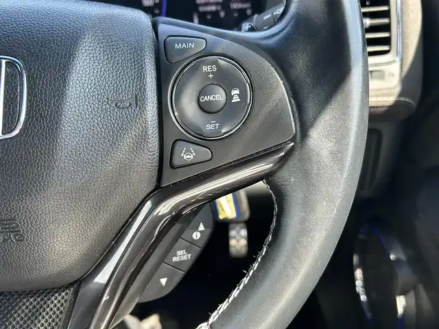 ホンダ ヴェゼル ハイブリッド RS ホンダセンシング 佐賀県 2019(平31)年 5.7万km ミッドナイトブルービームM /純正DOP8インチナビ≪VXM-197VFEi≫//バックカメラ//フルセグTV/DVD/Bluetooth/USB/HDMI//AppleＣａｒＰｌａｙ//ＲＳ専用ハーフレザーシート//シートヒーター//ＲＳ専用アルミホイール18インチ//電動パーキングブレーキ//オートブレーキホールド//スマートキー//スペアキー//ＥＴＣ//純正ドライブレコーダー//リアドライブレコーダー//ホンダセンシング//ＣＭＢＳ警報//ＡＣＣ≪アダプティブオートクルーズコントロール≫//先行車発進お知らせ//路外逸脱抑制システム//レーンキープアシストシステム//リアクティブフォースペダル//標識認識機能