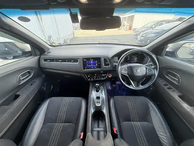ホンダ ヴェゼル ハイブリッド RS ホンダセンシング 佐賀県 2019(平31)年 5.7万km ミッドナイトブルービームM 純正DOP8インチナビ≪VXM-197VFEi≫/バックカメラ/・フルセグTV/DVD/Bluetooth/USB/HDMI//AppleＣａｒＰｌａｙ/ＲＳ専用ハーフレザーシート/シートヒーター/ＲＳ専用アルミホイール18インチ/電動パーキングブレーキ/・オートブレーキホールド/スマートキー/スペアキー/ＥＴＣ/純正ドライブレコーダー/リアドライブレコーダー/ホンダセンシング/・ＣＭＢＳ警報/・ＡＣＣ≪アダプティブオートクルーズコントロール≫/・先行車発進お知らせ/・路外逸脱抑制システム/・レーンキープアシストシステム/・リアクティブフォースペダル/・標識認識機能
