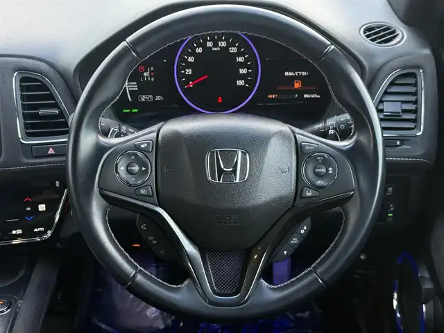 ホンダ ヴェゼル ハイブリッド RS ホンダセンシング 佐賀県 2019(平31)年 5.7万km ミッドナイトブルービームM 純正DOP8インチナビ≪VXM-197VFEi≫/バックカメラ/・フルセグTV/DVD/Bluetooth/USB/HDMI//AppleＣａｒＰｌａｙ/ＲＳ専用ハーフレザーシート/シートヒーター/ＲＳ専用アルミホイール18インチ/電動パーキングブレーキ/・オートブレーキホールド/スマートキー/スペアキー/ＥＴＣ/純正ドライブレコーダー/リアドライブレコーダー/ホンダセンシング/・ＣＭＢＳ警報/・ＡＣＣ≪アダプティブオートクルーズコントロール≫/・先行車発進お知らせ/・路外逸脱抑制システム/・レーンキープアシストシステム/・リアクティブフォースペダル/・標識認識機能