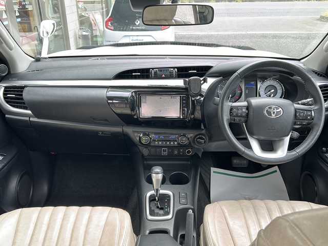 トヨタ ハイラックス Z 埼玉県 2021(令3)年 5.1万km スーパーホワイトⅡ 純正ナビ　/ＥＴＣ/リフトアップ１インチ/フロントJAOSスプリング/リアB4Lボディリフト/バグガード/社外サイド出しマフラー（5ZIGEN）/シートヒーター　/スペアキー２　/ＡＭ／ＦＭ／ＴＶ／ＢＴ／ＳＤ／ＤＶＤ　/バックカメラ　/レーンアシスト　/プッシュスタート　/レーダークルーズコントロール　/ＬＥＤヘッドライト/アイドリングストップ/保証書　/取扱説明書