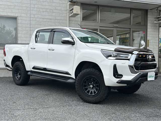 トヨタ ハイラックス Z 埼玉県 2021(令3)年 5.1万km スーパーホワイトⅡ 純正ナビ　/ＥＴＣ/リフトアップ１インチ/フロントJAOSスプリング/リアB4Lボディリフト/バグガード/社外サイド出しマフラー（5ZIGEN）/シートヒーター　/スペアキー２　/ＡＭ／ＦＭ／ＴＶ／ＢＴ／ＳＤ／ＤＶＤ　/バックカメラ　/レーンアシスト　/プッシュスタート　/レーダークルーズコントロール　/ＬＥＤヘッドライト/アイドリングストップ/保証書　/取扱説明書